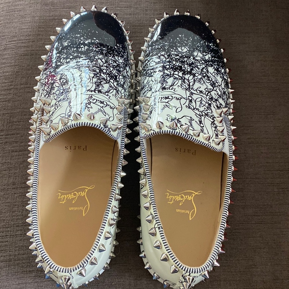 Louboutin sneakers lightly worn